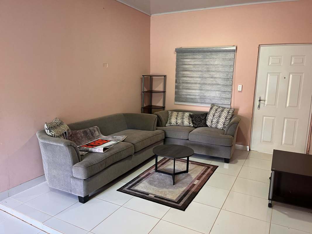 Simple empty bedroom space with windows and tiled floor countryside property Utive Pacora