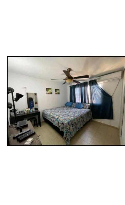 Main bedroom with king bed, AC unit, ceiling fan, window at PH Altos de la Primavera Panama City