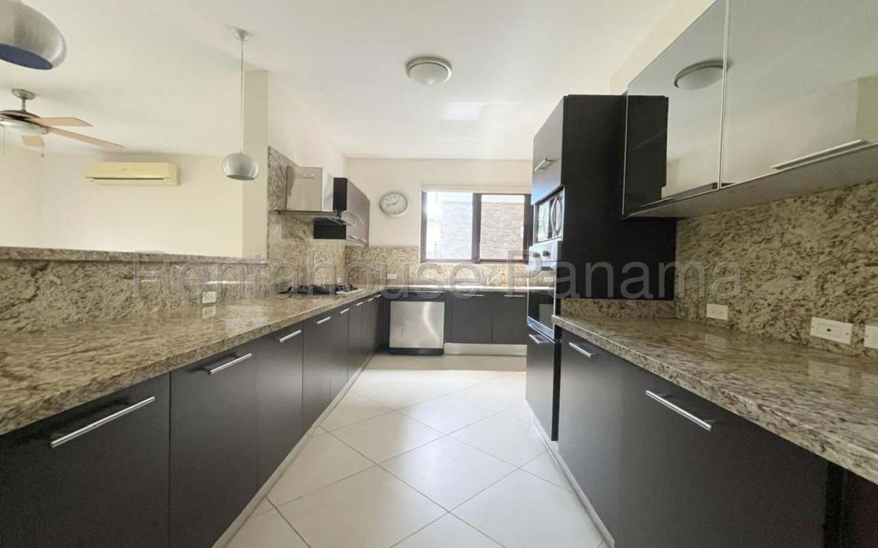 Large living room with garden view balcony Embassy Club Clayton Panama