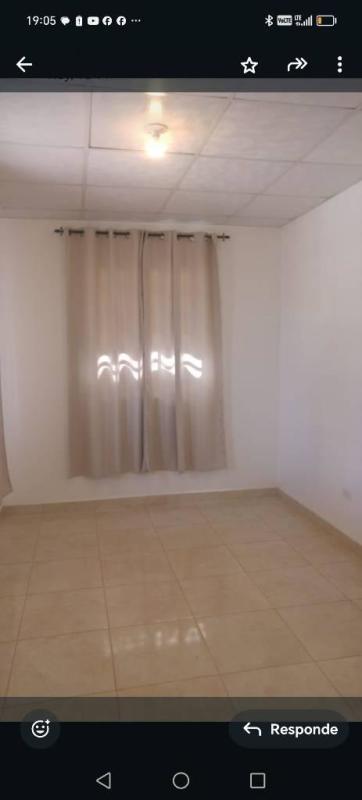 Garage with security gate concrete floor Villa Verona 24 de Diciembre Panama house