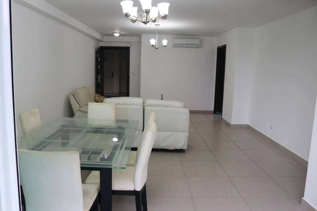 Open layout living dining with chandeliers and tile flooring in PH Condado Country Club Panama City