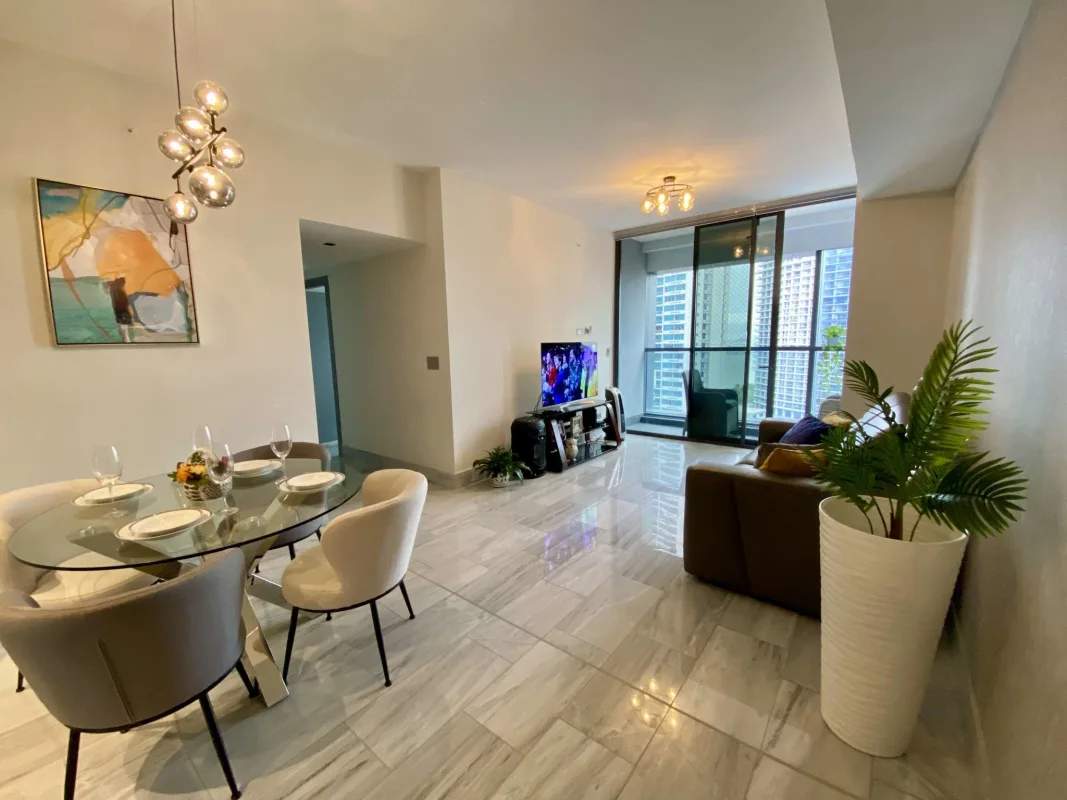 Private balcony with panoramic skyline and bay views at PH Nuovo by Armani Casa Panama