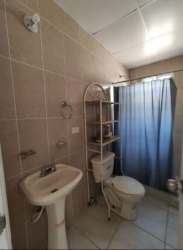 Empty bedroom with tiled floor, large window and closet area in Costa Oeste Valparaíso Puerto Caimito Panama