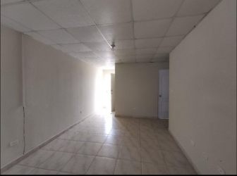 Spacious empty room with tile flooring and door in affordable Costa Oeste Valparaíso home Panama
