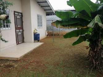 Garden area with banana trees entry view Costa Oeste Valparaíso Puerto Caimito Panama