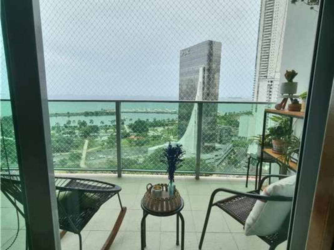 Furnished balcony with panoramic ocean and city views at Allure at the Park, Panama City