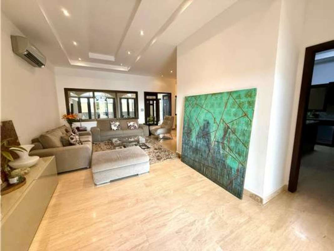 Modern open kitchen with granite countertops and island Sunset Coast Costa Sur