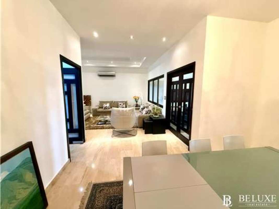 Spacious covered terrace with BBQ area next to garden and private pool in Sunset Coast Costa Sur Panama