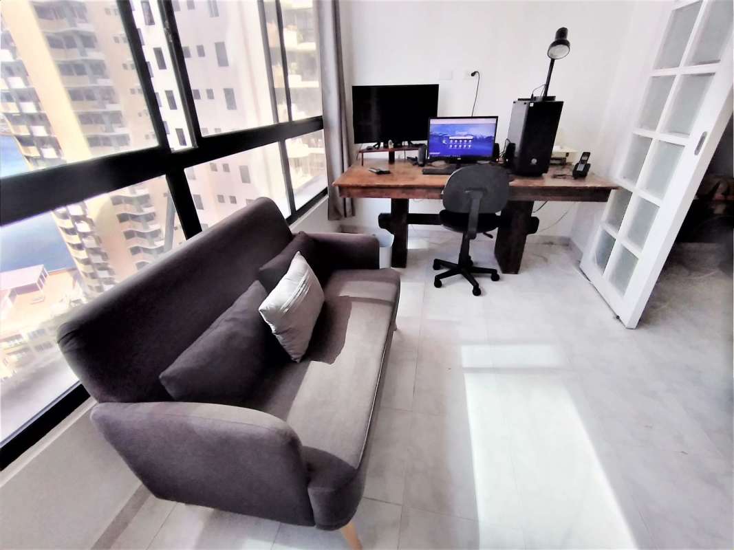 Bright bedroom with large window ocean view in PH Pacific Point apartment Panama City