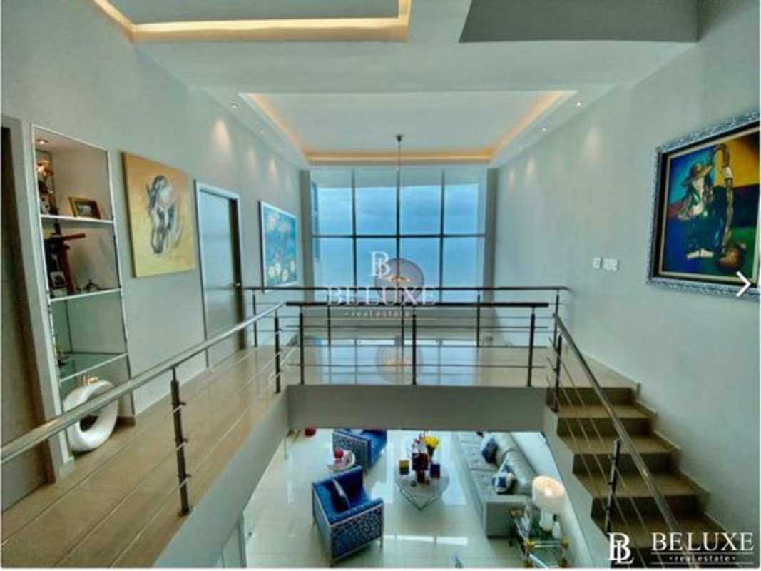 Modern mezzanine loft space with ocean and skyline views, PH Icon Tower Panama