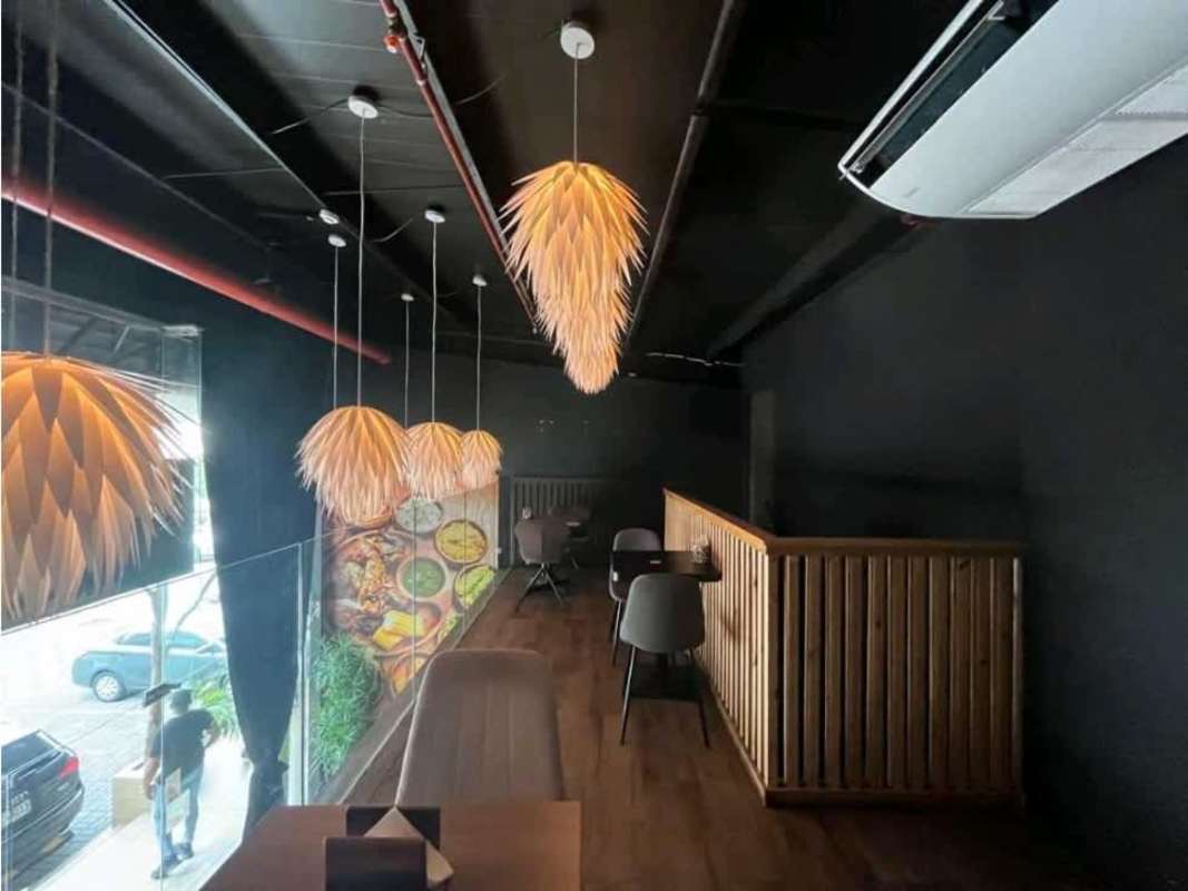 Bathroom with pedestal sink, black subway tile, mirror, dispensers commercial space San Francisco Panama