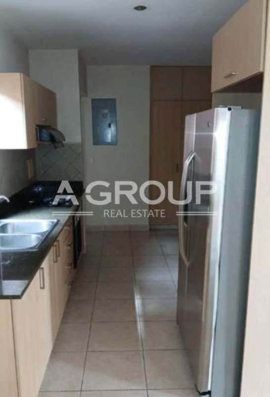 Wooden staircase with black railing contemporary home PH Versalles I Panama