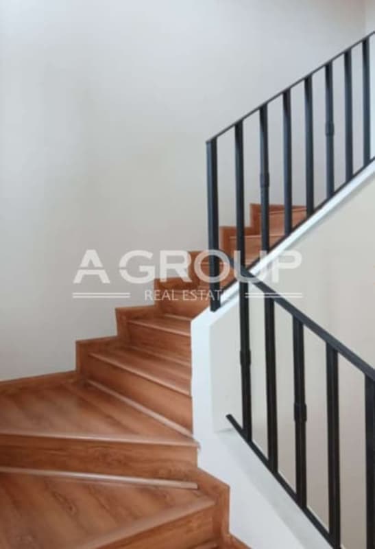 Bright bedroom with large window wood flooring PH Versalles I Panama City Juan Díaz