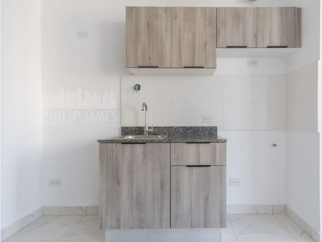 View of Panama City skyline from private balcony in PH The Gray Calle 50 apartment for sale