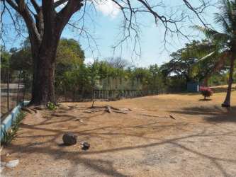 Open living dining area with large windows hardwood tile floors Cabuya Las Lajas Panama