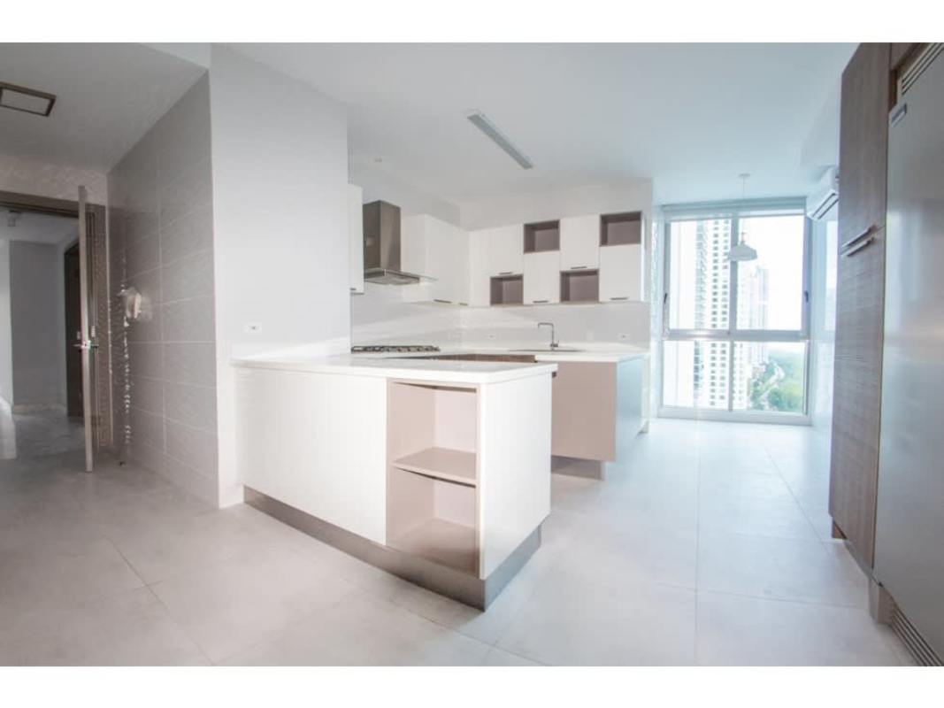 Spacious living room with marble flooring and large glass doors to balcony in PH Regalia Panama City