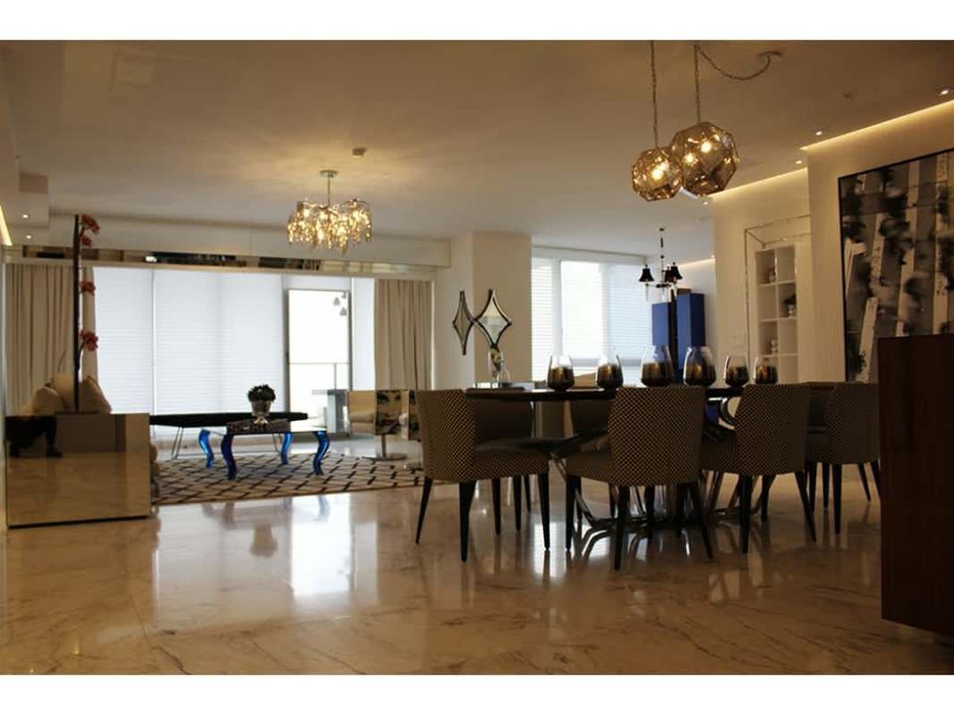 Spacious open-plan modern living and dining area marble floor luxury condo Panama