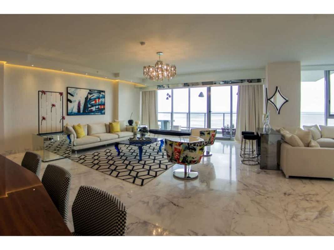 Open-plan living area with marble floors and panoramic windows Panama City