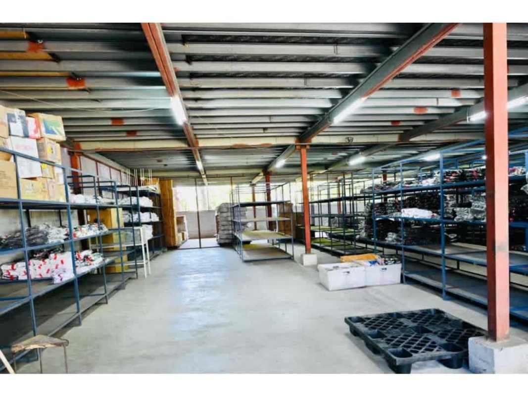 Warehouse space with metal rack shelving interior Pueblo Nuevo