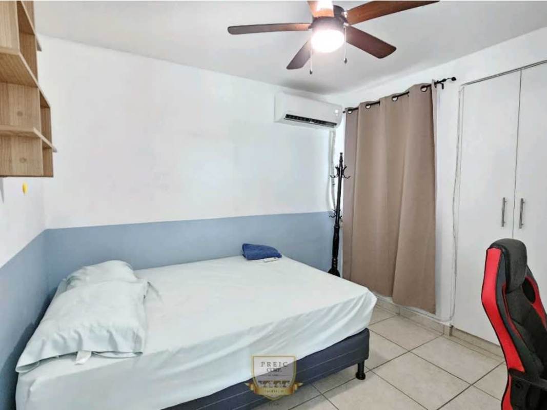 Indoor gym with cardio and strength equipment at PH Prisma Panama City