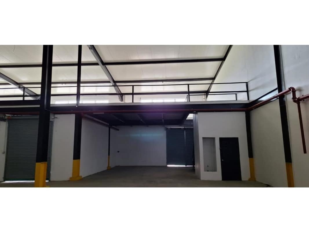 Warehouse interior clear span structure option for office mezzanine Pacora