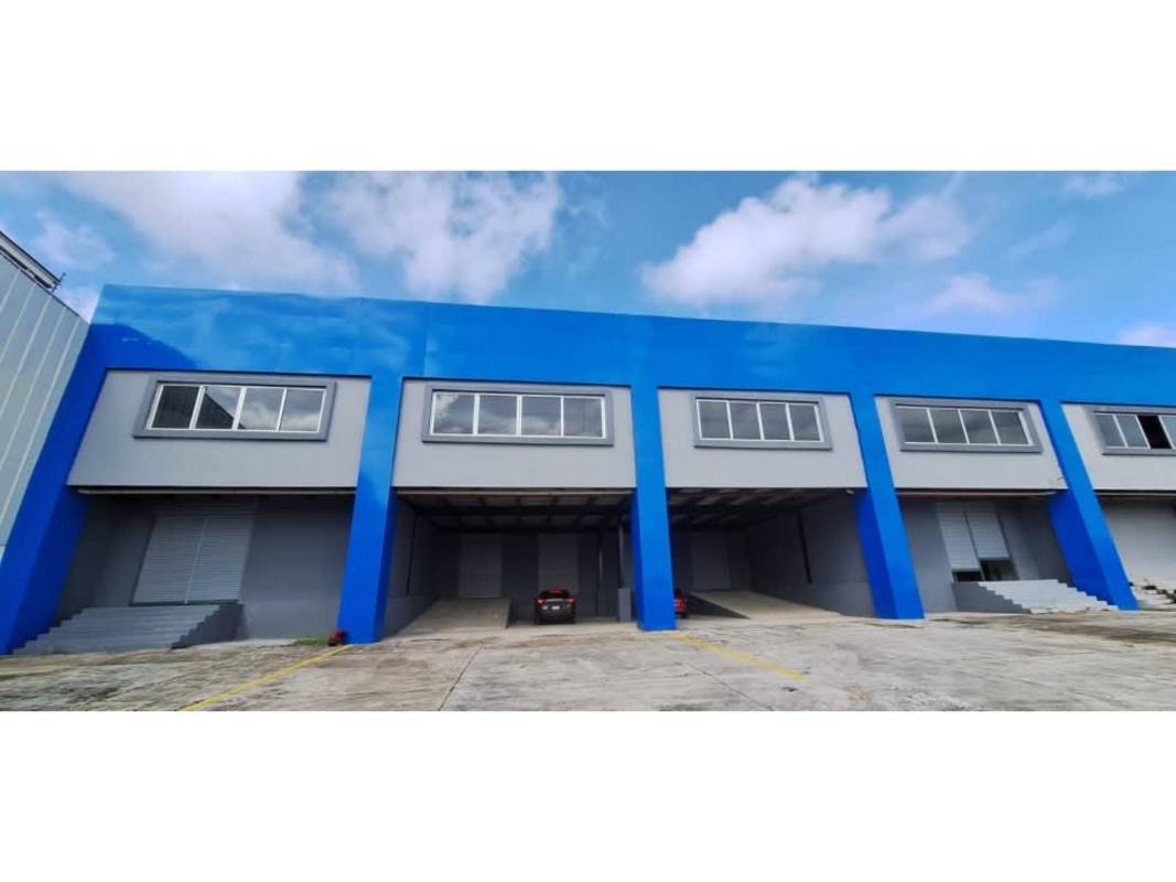 Exterior of large industrial warehouse with multiple loading bays Parque Industrial Las Americas Panama