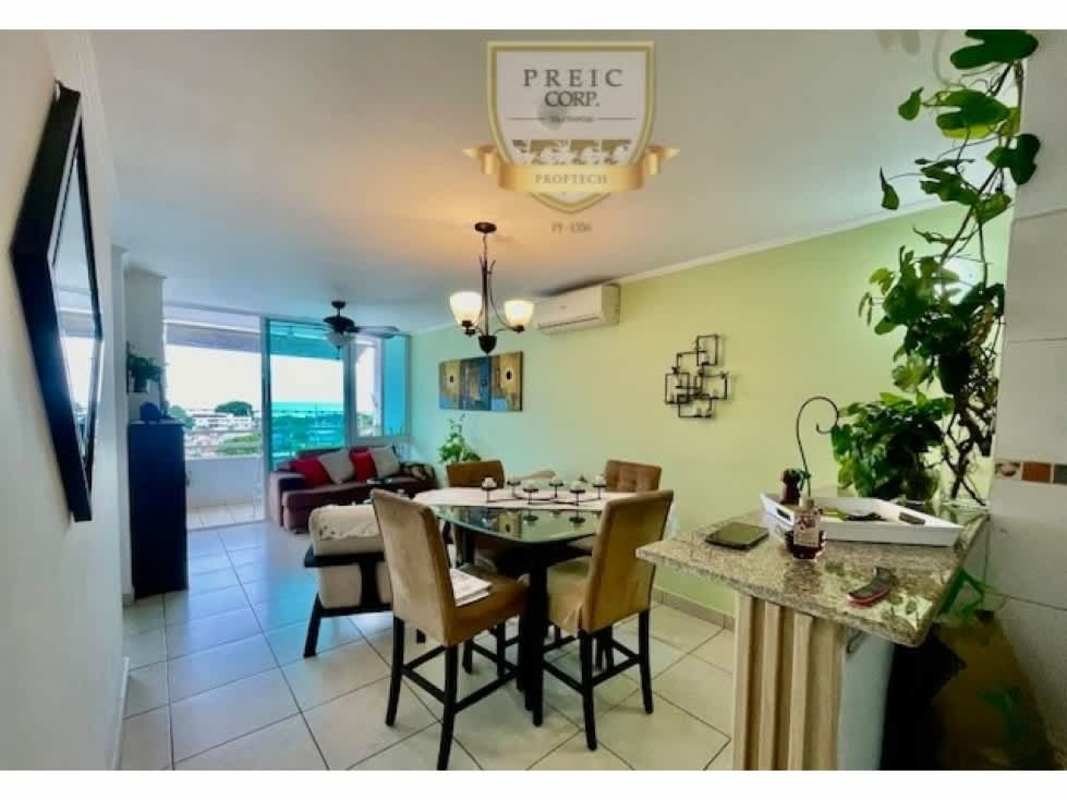 Kitchen with granite countertop and wood cabinets in PH Parque Lefevre Panama