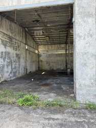 Perimeter wall surrounding industrial property large lot warehouse for sale Panama