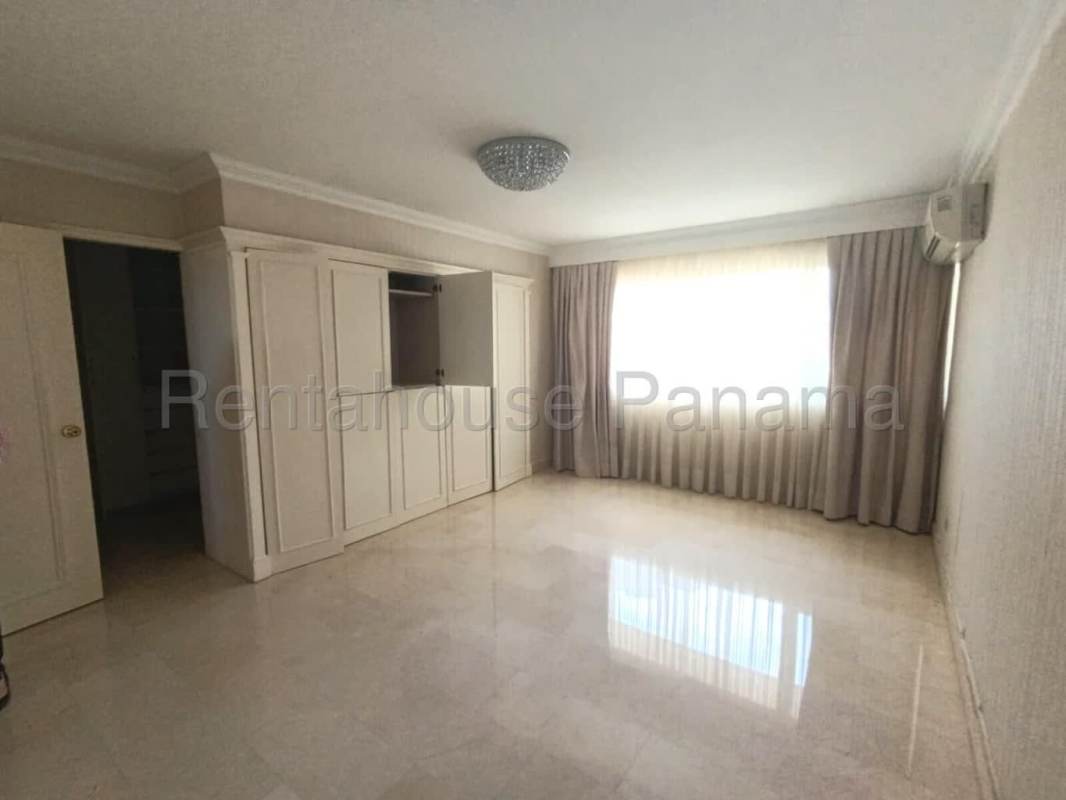 Spacious covered balcony overlooking city skyline PH Diplomático Obarrio Panama City