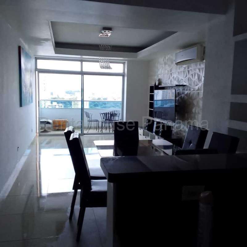 Bedroom with built-in closets, AC unit and tile floors at PH Famagosta Loft Panama City