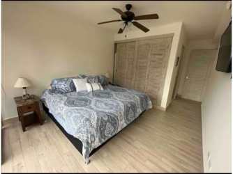 Modern white kitchen with granite counters and breakfast bar PH Playa Caracol Punta Chame Panama