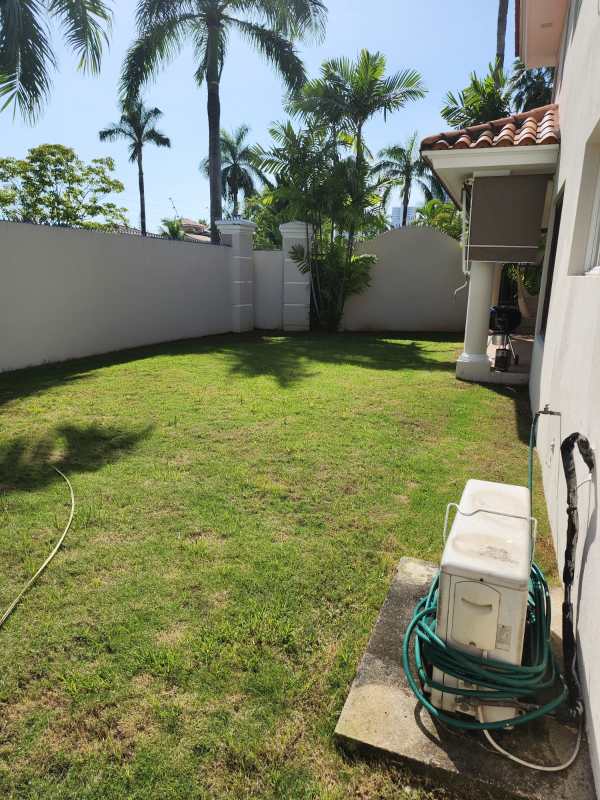 Living room with hardwood floors, arc lamp, sectional sofa Costa del Este house
