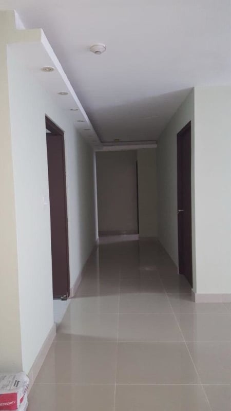 Modern kitchen with granite countertops and wood cabinetry in PH Obarrio Central Panama