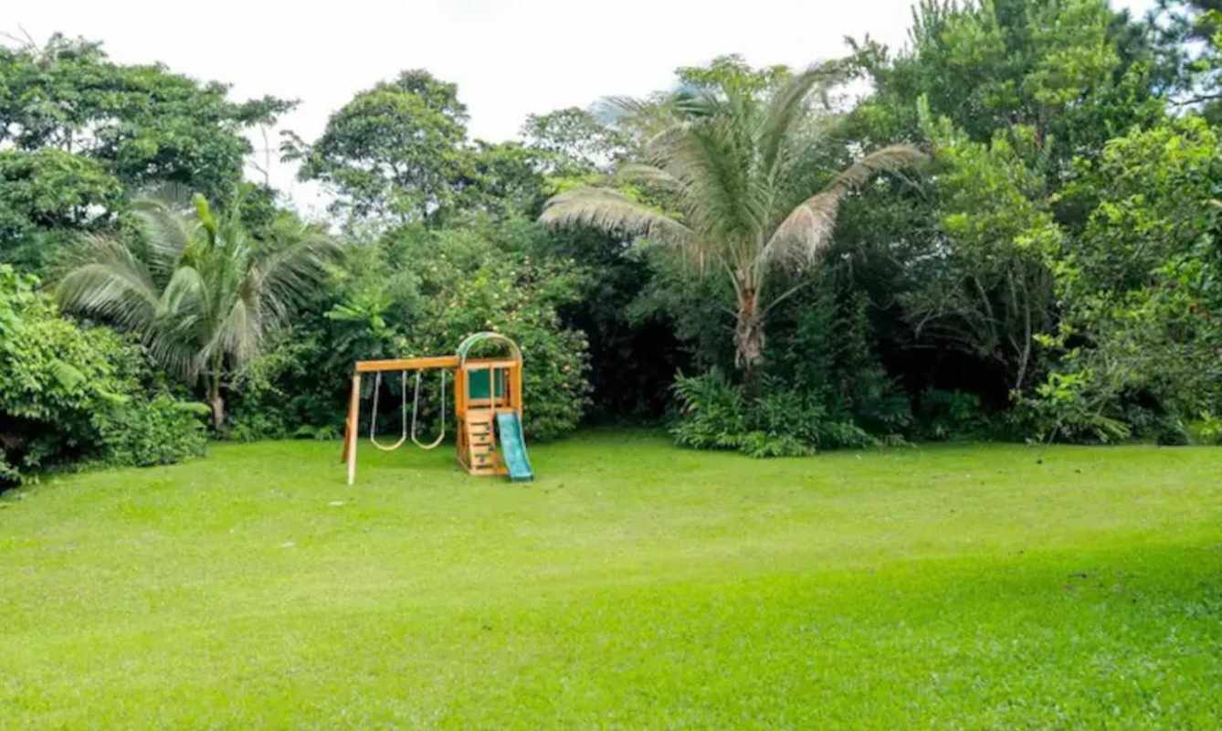 Jacuzzi tub on terrace overlooking mountains and forest in Altos de Cerro Azul Panama