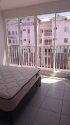 Bedroom with sliding glass doors opening to balcony PH Vista Azul Vacamonte Panama