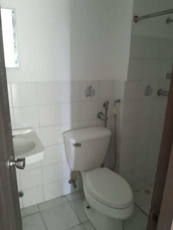 Minimalist kitchen with bright window and tile floor for rent Costa del Este Panama