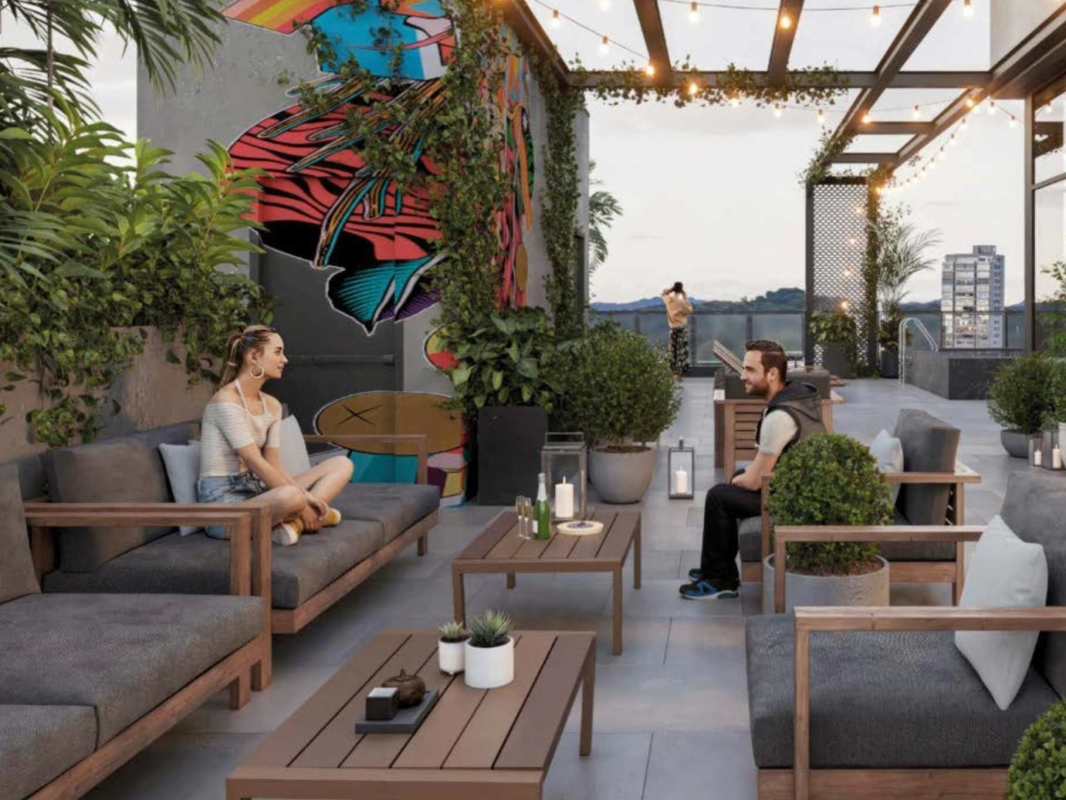 Modern co-working lounge with colorful mural, natural light at PH Vista Balboa, Panama