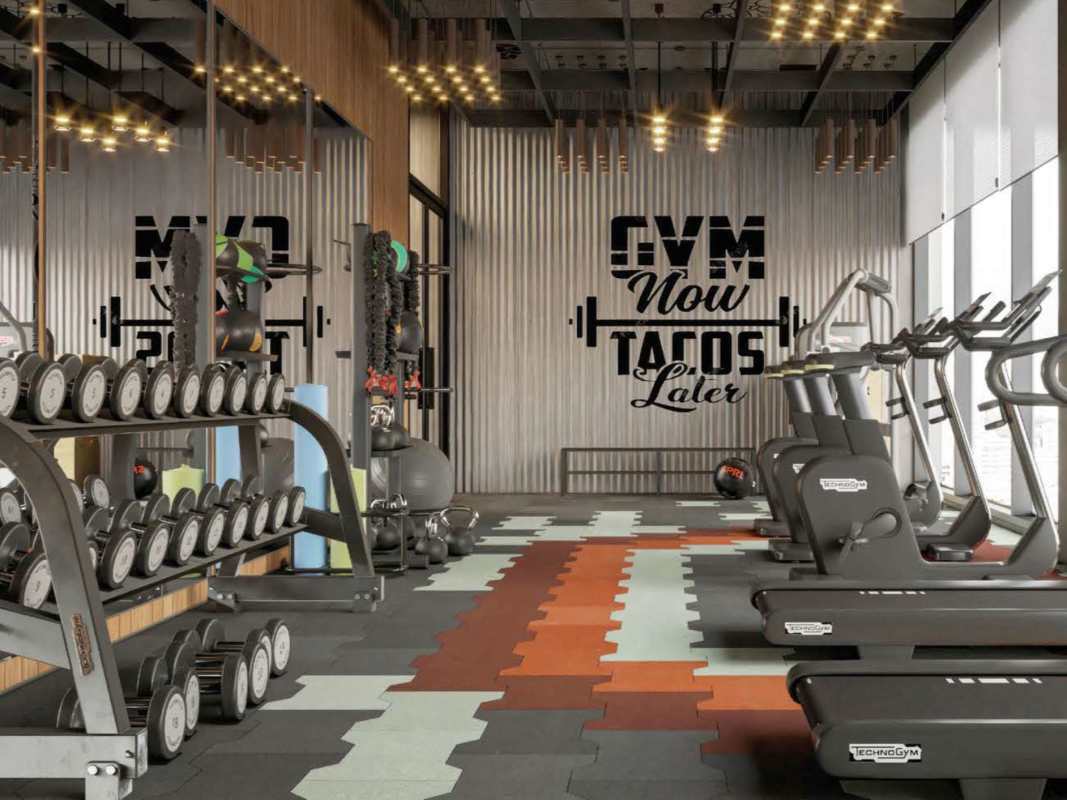 Modern gym fully equipped with weights, cardio and training areas at PH Vista Balboa Panama