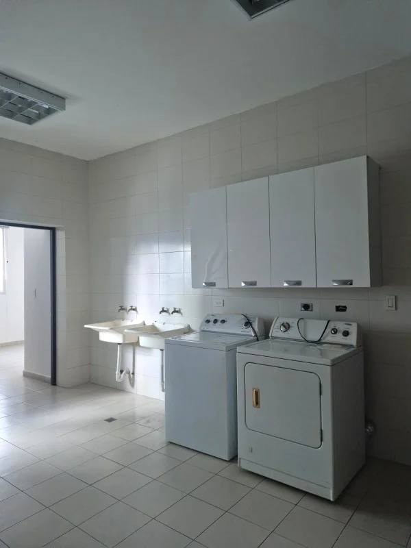 Oceanfront infinity pool with lounge chairs and skyline views at Trump Ocean Club JW Marriott Punta Pacifica Panama