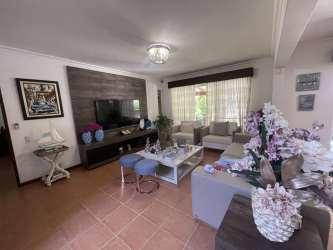 Large living room with comfy sofa, TV, terrace access in Royal Decameron Townhouse