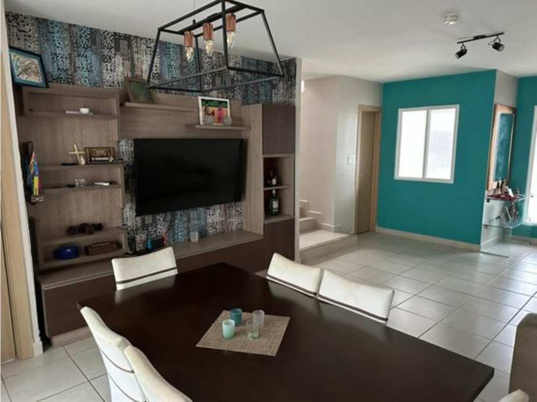 Covered backyard terrace with hammock chair and garden in PH Victoria Panama