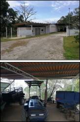 Rural driveway leading to fenced enclosures with animal shelters at finca in Sora Panama
