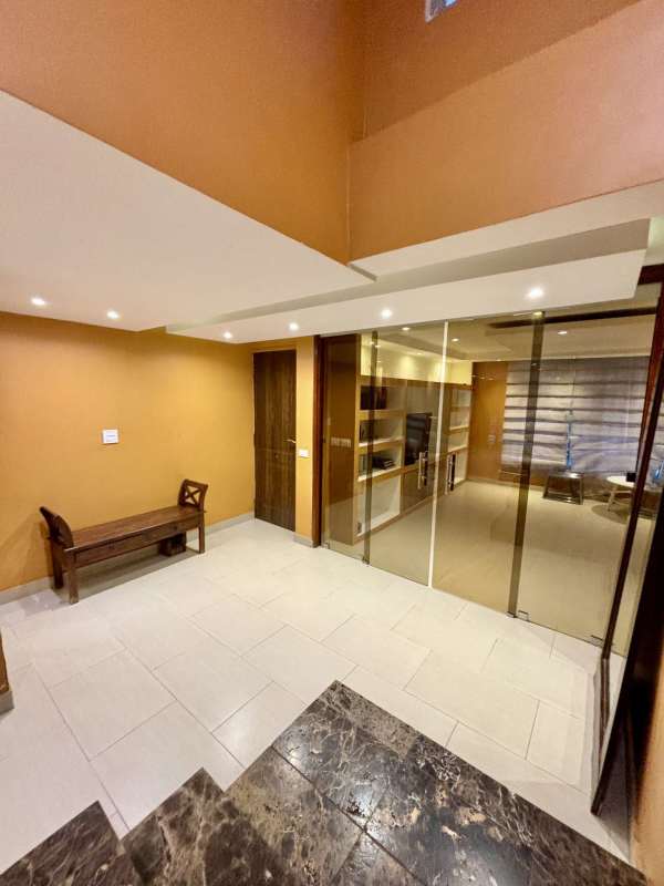 Spacious living and dining area with porcelain floors and large windows in Villa Lilla San Francisco house