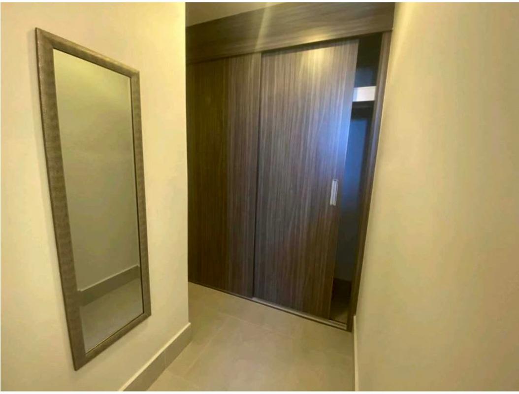 Second bedroom with closet and large window in PH Buona Vista Bella Vista Panama
