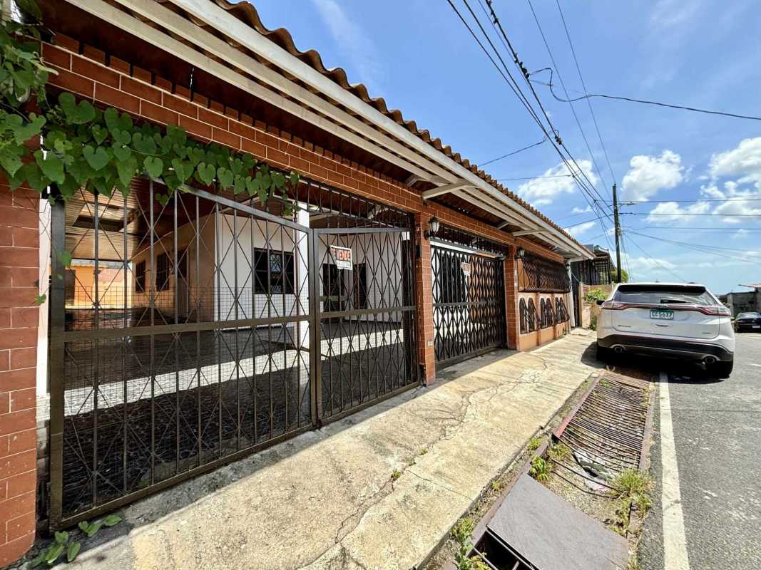 Bathroom with pedestal sink, frosted glass shower, wall cabinet in Las Mañanitas home