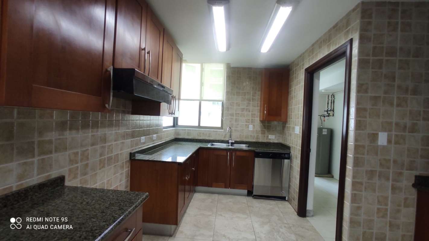 Formal dining area with marble flooring and recessed lighting in PH Ocean Park Punta Pacífica Panama