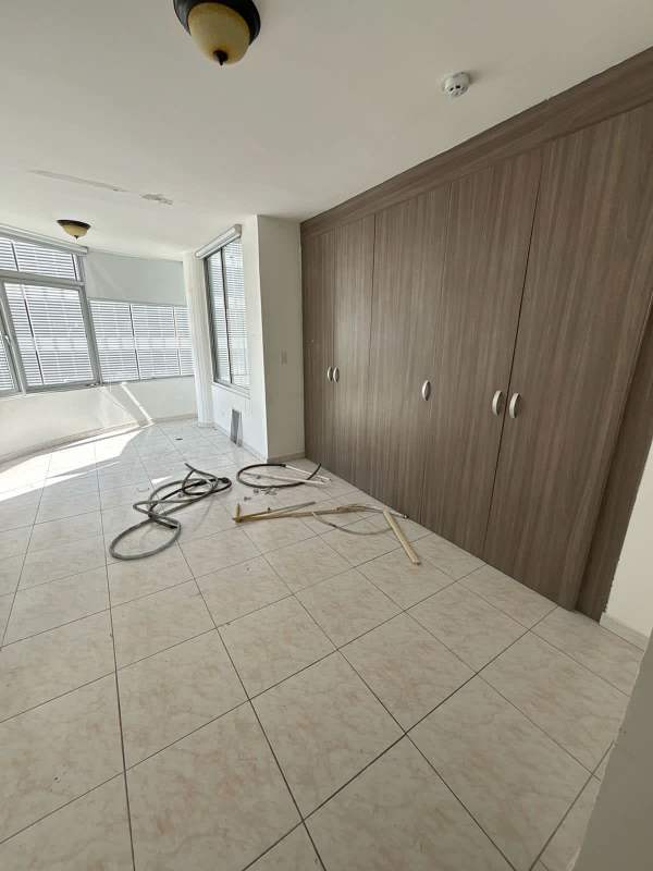 Bathroom with glass shower and granite sink PH Dveaux San Francisco Panama