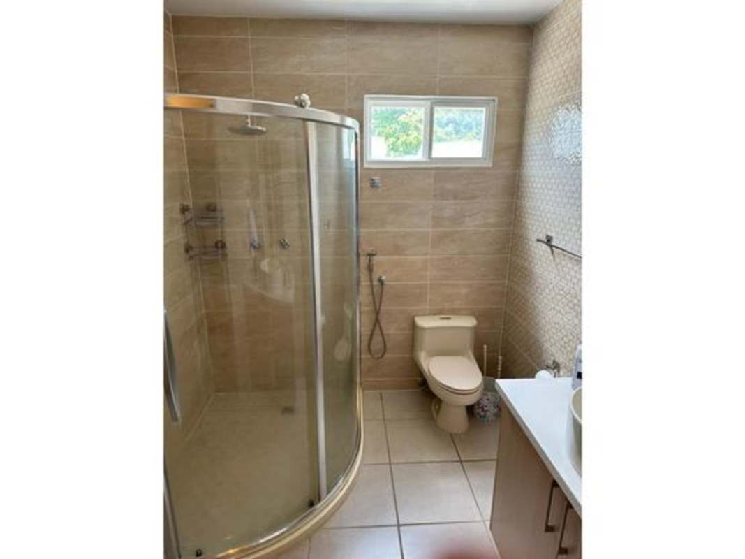 Modern kitchen with cabinetry granite style countertops stove oven PH Victoria Panama