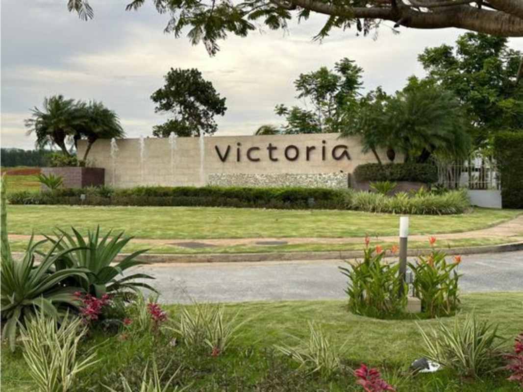 View of pool, gym and tennis court in PH Victoria gated community Brisas del Golf Panama