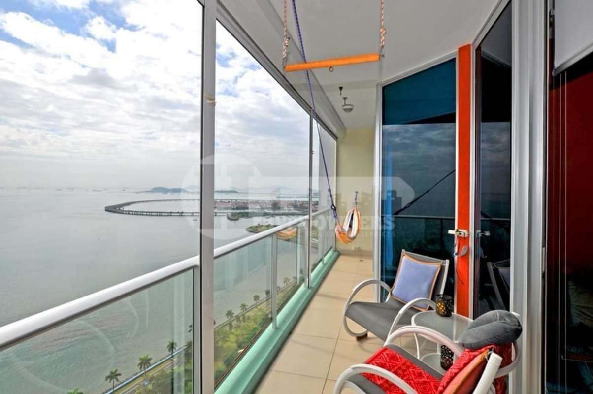 Modern living area with ocean views and large windows at PH Destiny Panama City